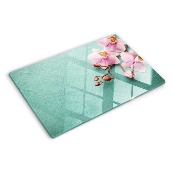 Tabla de cortar Orquídeas sobre fondo azul