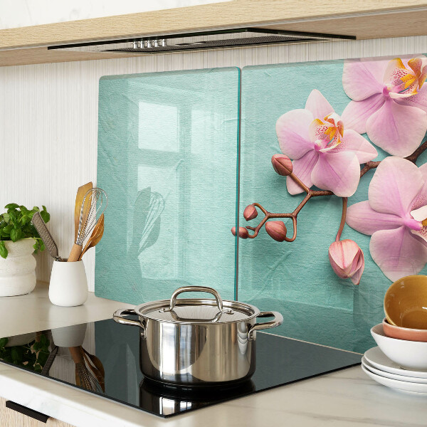 Tabla de cortar Orquídeas sobre fondo azul