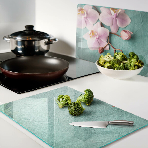 Tabla de cortar Orquídeas sobre fondo azul