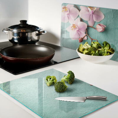 Tabla de cortar Orquídeas sobre fondo azul