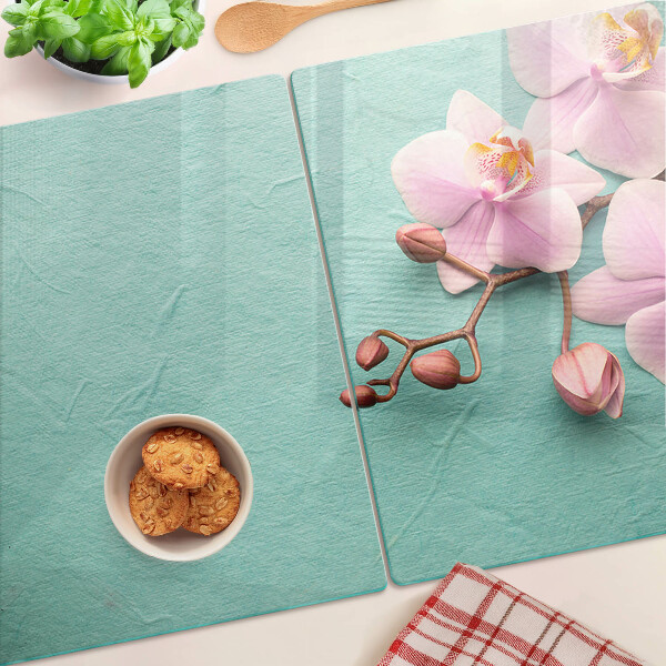 Tabla de cortar Orquídeas sobre fondo azul