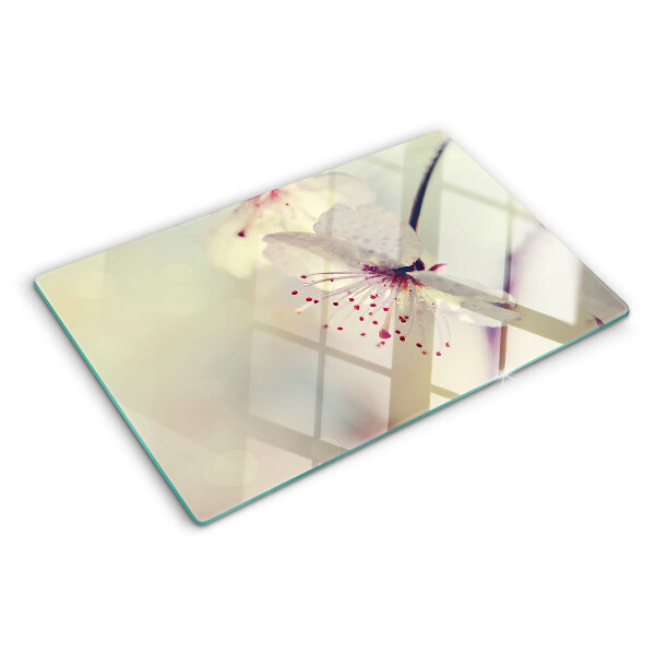 Tabla de cocina Flores sobre un fondo geométrico