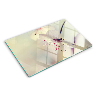 Tabla de cocina Flores sobre un fondo geométrico