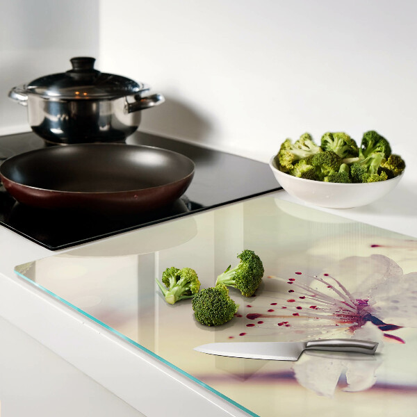 Tabla de cocina Flores sobre un fondo geométrico