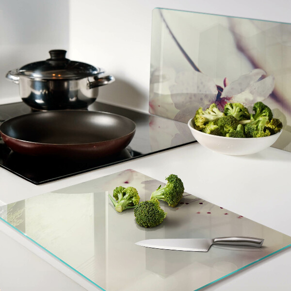 Tabla de cocina Flores sobre un fondo geométrico