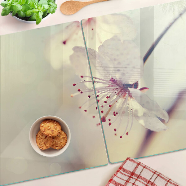 Tabla de cocina Flores sobre un fondo geométrico