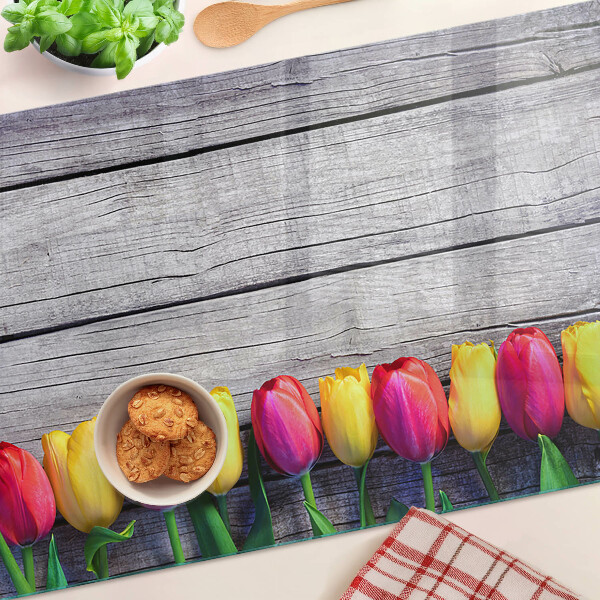 Tabla para cortar Tulipanes sobre un fondo de madera