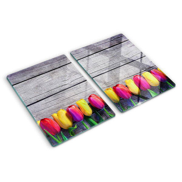 Tabla para cortar Tulipanes sobre un fondo de madera