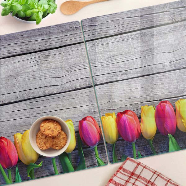 Tabla para cortar Tulipanes sobre un fondo de madera