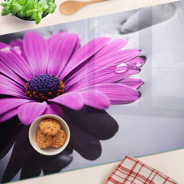 Tabla para cortar Flor morada con gotas de agua