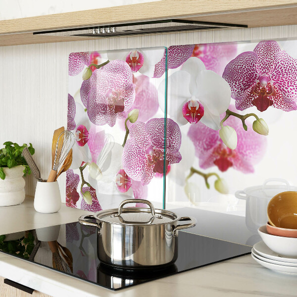 Szklana deska do krojenia Orchidee na tle okna