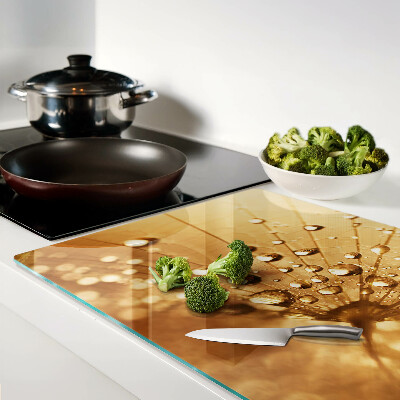 Tabla para cortar Gotas de agua sobre un diente de león