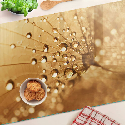 Tabla para cortar Gotas de agua sobre un diente de león