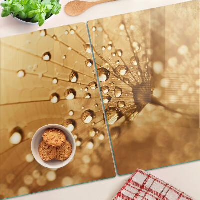 Tabla para cortar Gotas de agua sobre un diente de león