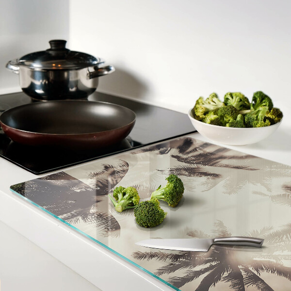 Tabla de cortar de cristal Palmeras sobre un fondo monocromático