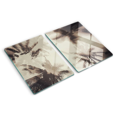 Tabla de cortar de cristal Palmeras sobre un fondo monocromático
