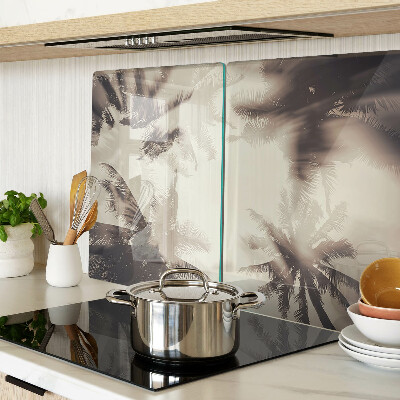 Tabla de cortar de cristal Palmeras sobre un fondo monocromático