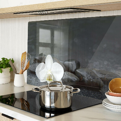 Szklana deska do krojenia Kwiat orchidei na kamieniach