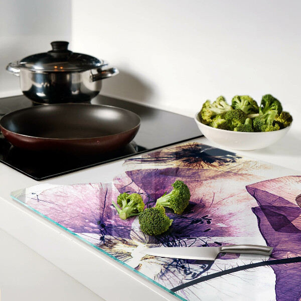 Tabla para cortar Flores en tonos morados y amarillos.