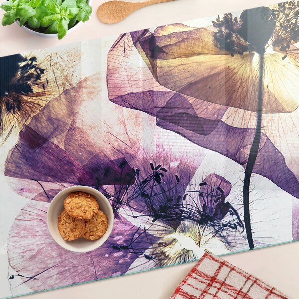 Tabla para cortar Flores en tonos morados y amarillos.