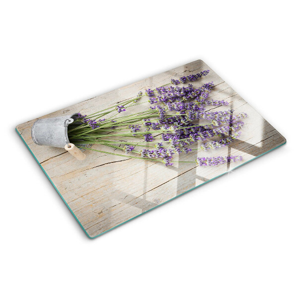 Tabla de cortar de cristal Lavanda en una maceta sobre un fondo de madera