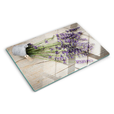 Tabla de cortar de cristal Lavanda en una maceta sobre un fondo de madera