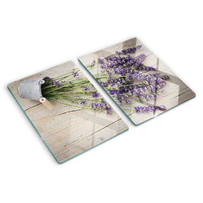 Tabla de cortar de cristal Lavanda en una maceta sobre un fondo de madera