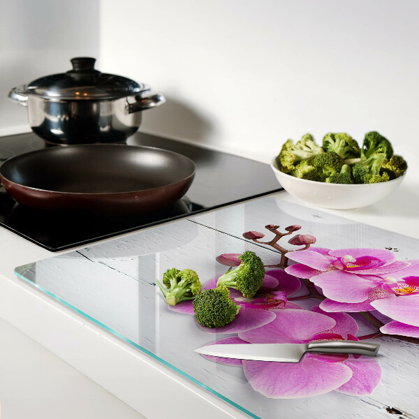 Szklana deska do krojenia Orchidee na białym tle