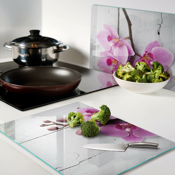 Tabla de cortar Orquídeas sobre fondo blanco