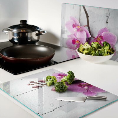 Szklana deska do krojenia Orchidee na białym tle