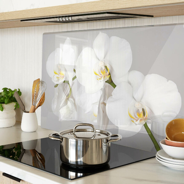 Tabla de cortar Orquídeas sobre un fondo de espejo