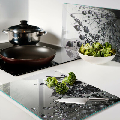 Tabla de cortar Gotas de agua sobre las plantas