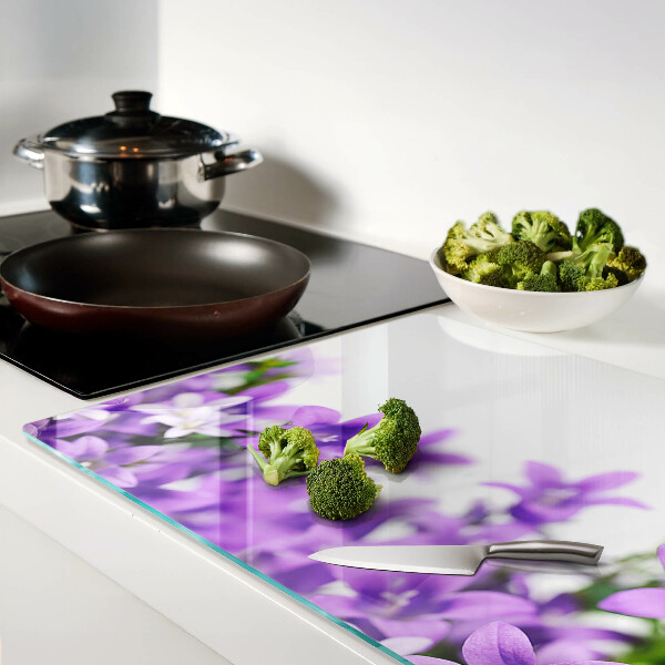 Szklana deska do krojenia Fioletowe kwiaty w tle