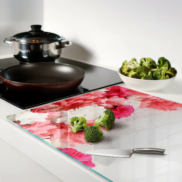 Tabla de cocina Flores en tonos rosa y blanco.