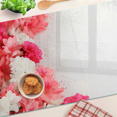 Tabla de cocina Flores en tonos rosa y blanco.