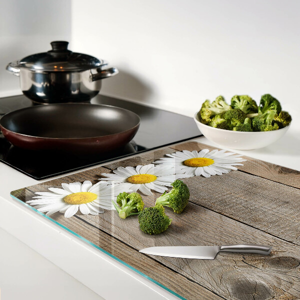 Tabla para cortar Flores sobre un fondo de madera