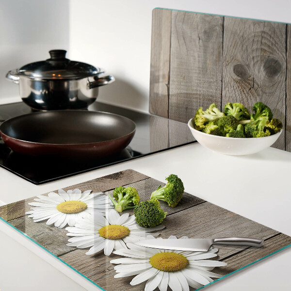 Tabla para cortar Flores sobre un fondo de madera