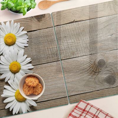Tabla para cortar Flores sobre un fondo de madera