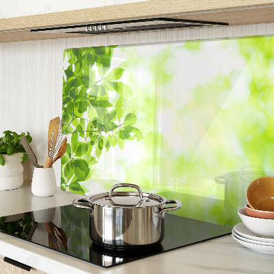 Tabla de cortar de cristal Hojas verdes a la luz