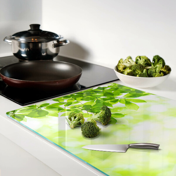 Tabla de cortar de cristal Hojas verdes a la luz