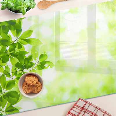 Tabla de cortar de cristal Hojas verdes a la luz