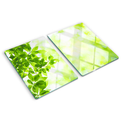 Tabla de cortar de cristal Hojas verdes a la luz