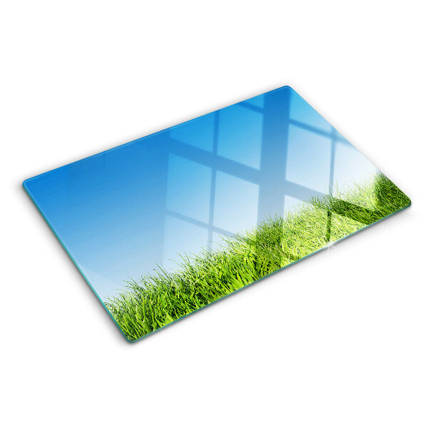 Tabla de cortar de cristal Prado verde bajo un cielo azul