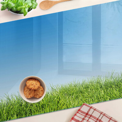 Tabla de cortar de cristal Prado verde bajo un cielo azul