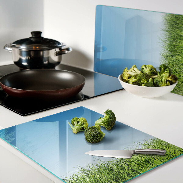 Tabla de cortar de cristal Prado verde bajo un cielo azul