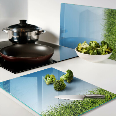 Tabla de cortar de cristal Prado verde bajo un cielo azul