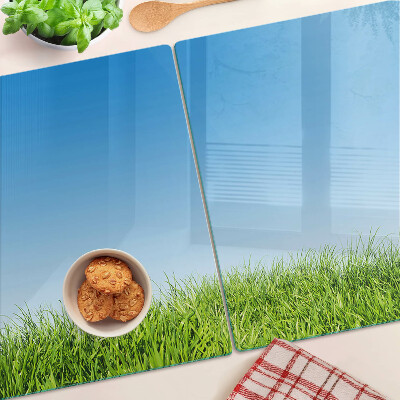 Tabla de cortar de cristal Prado verde bajo un cielo azul