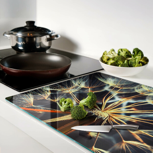 Tabla de cortar de cristal Dientes de león en la fotografía macro