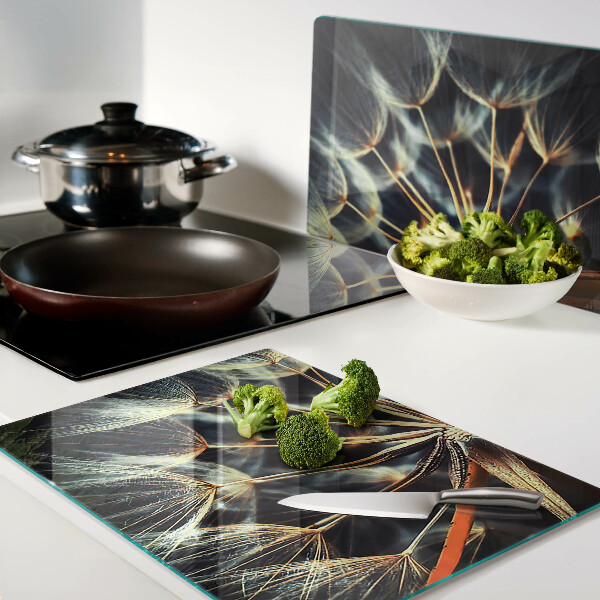 Tabla de cortar de cristal Dientes de león en la fotografía macro