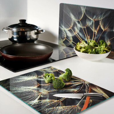 Tabla de cortar de cristal Dientes de león en la fotografía macro